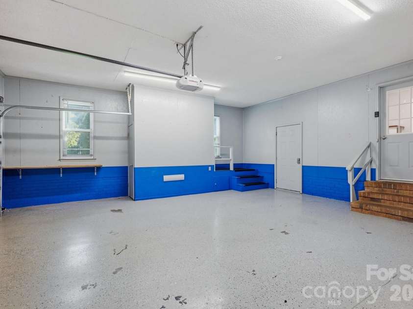 1307 Bennington Drive, Concord, NC 28027.  MLS# CAR4394674, YatesRealty ID 34794. Garage with 2 storage rooms!