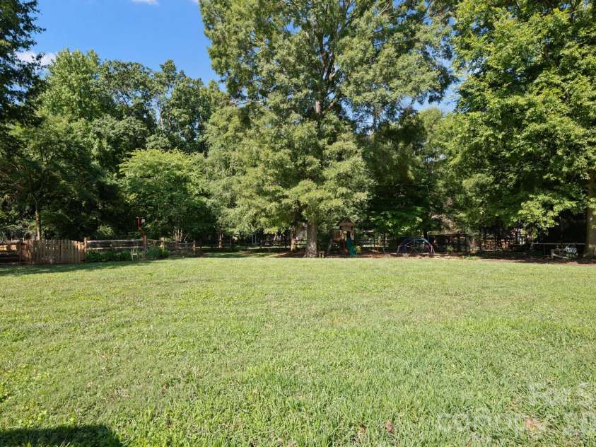 1307 Bennington Drive, Concord, NC 28027.  MLS# CAR4394674, YatesRealty ID 34794. Large, flat, fenced backyard