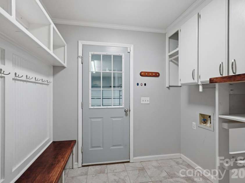 1307 Bennington Drive, Concord, NC 28027.  MLS# CAR4394674, YatesRealty ID 34794. Laundry & drop zone from garage!