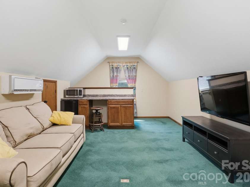 1307 Bennington Drive, Concord, NC 28027.  MLS# CAR4394674, YatesRealty ID 34794. Rec rm above add'l garage-bar, fridge, microwave, attic