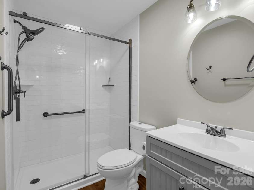 102 Little House Road, Tryon, NC 28782.  MLS# CAR4395384, YatesRealty ID 34796. Main level bathroom