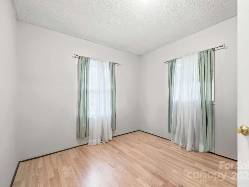 150 First Street, Fort Mill, SC 29708.  MLS# CAR4291591, YatesRealty ID 34798. Digitally altered to remove personal items.