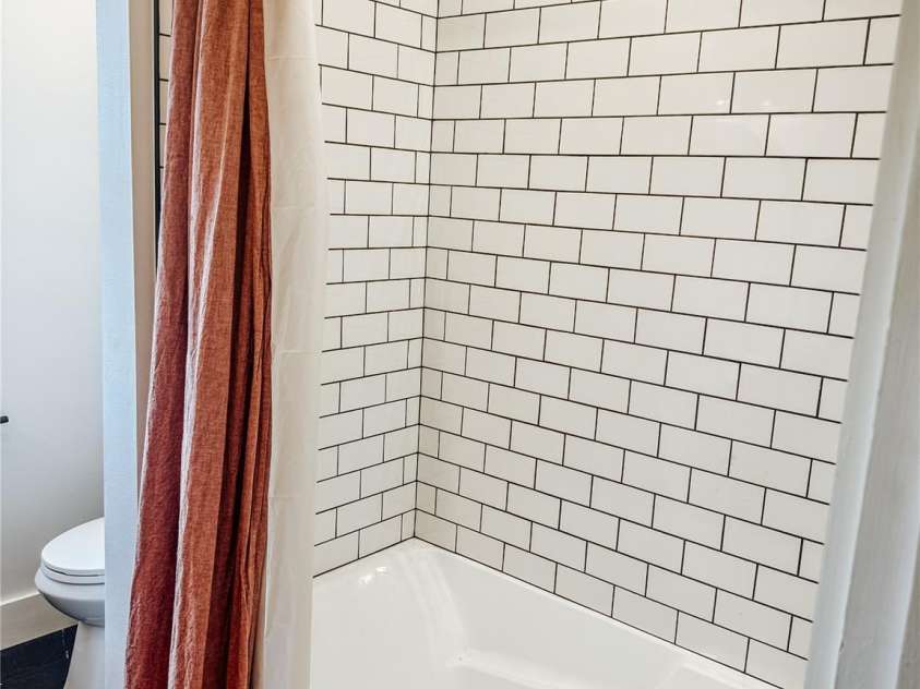 111 Bennett Street, Burnsville, NC 28714.  MLS# CAR4390784, YatesRealty ID 34804. Downstairs Bathroom