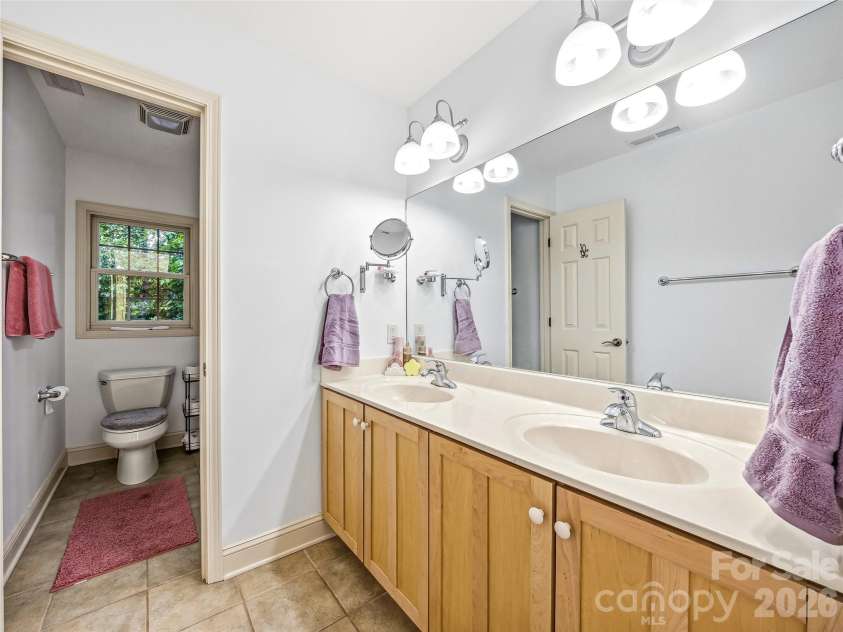 840 Stoney Stream Lane, Arden, NC 28704.  MLS# CAR4394333, YatesRealty ID 34811. Shared bath on the upper floor