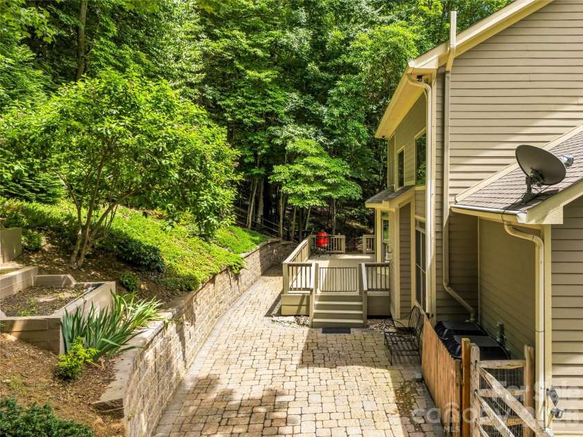 840 and 856 Stoney Stream Lane, Arden, NC 28704.  MLS# CAR4396084, YatesRealty ID 34812. The back patio and deck