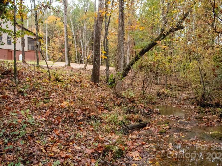 110 Rupard Road, Statesville, NC 28625.  MLS# CAR4232125, YatesRealty ID 34816. House from creek