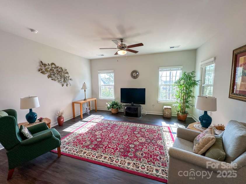 5047 Summer Surprise Lane, Charlotte, NC 28215.  MLS# CAR4219026, YatesRealty ID 3482. Spacious living room open to the kitchen.