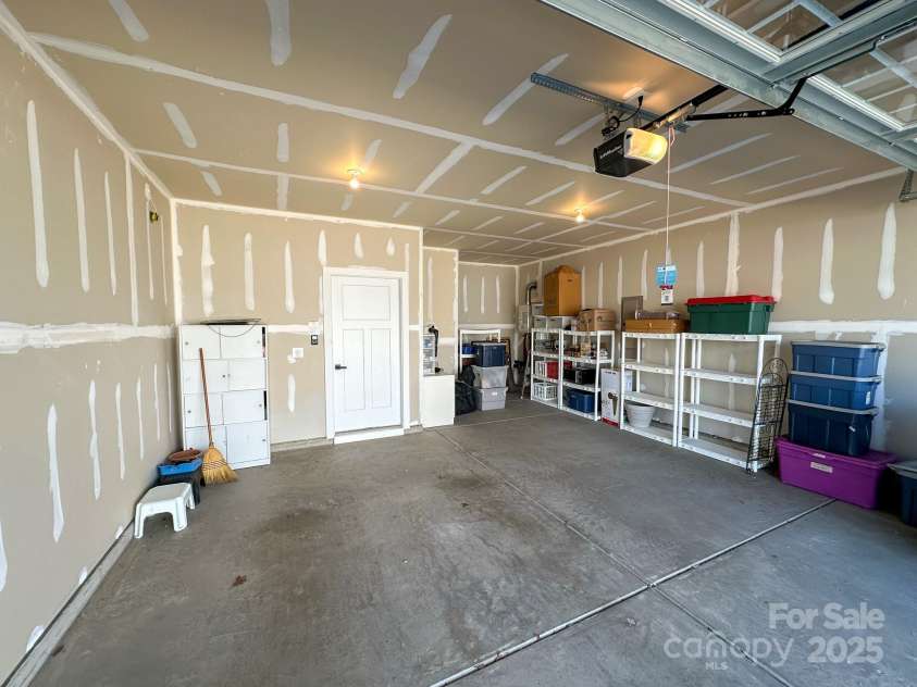 5047 Summer Surprise Lane, Charlotte, NC 28215.  MLS# CAR4219026, YatesRealty ID 3482. Tankless water heater located in garage.