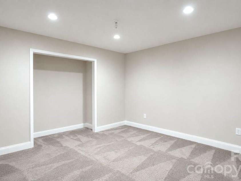 16032 Loch Raven Road, Huntersville, NC 28078.  MLS# CAR4366839, YatesRealty ID 34822. Basement Level Flex Space