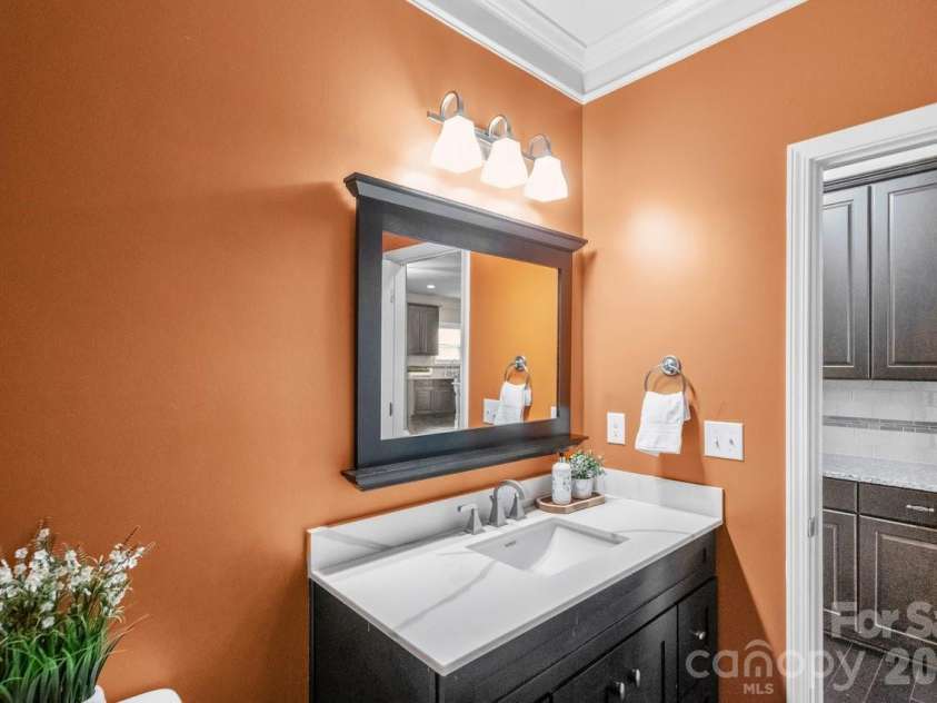16032 Loch Raven Road, Huntersville, NC 28078.  MLS# CAR4366839, YatesRealty ID 34822. Main Level Half Bath