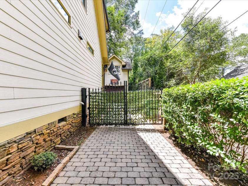 1716 Bay Street, Charlotte, NC 28204.  MLS# CAR4289594, YatesRealty ID 34826. Gated driveway for privacy!