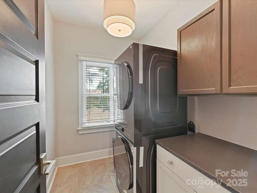 1716 Bay Street, Charlotte, NC 28204.  MLS# CAR4289594, YatesRealty ID 34826. Laundry Room on upper level with built in cabinets!