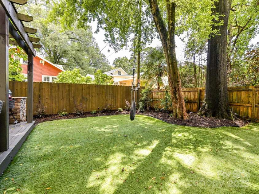 1716 Bay Street, Charlotte, NC 28204.  MLS# CAR4289594, YatesRealty ID 34826. Private, Fenced Back Yard with turf & mature trees for perfect shade!