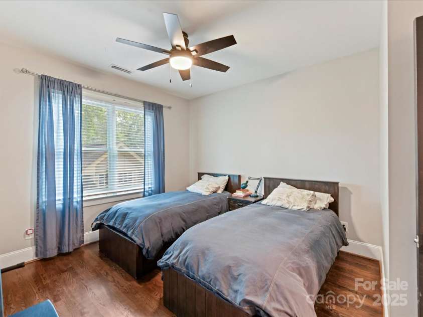 1716 Bay Street, Charlotte, NC 28204.  MLS# CAR4289594, YatesRealty ID 34826. Secondary Bedroom on upper level with ceiling fan/light & hardwood floors!