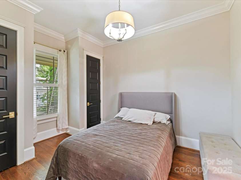 1716 Bay Street, Charlotte, NC 28204.  MLS# CAR4289594, YatesRealty ID 34826. Secondary Bedroom with crown molding & hardwoods!