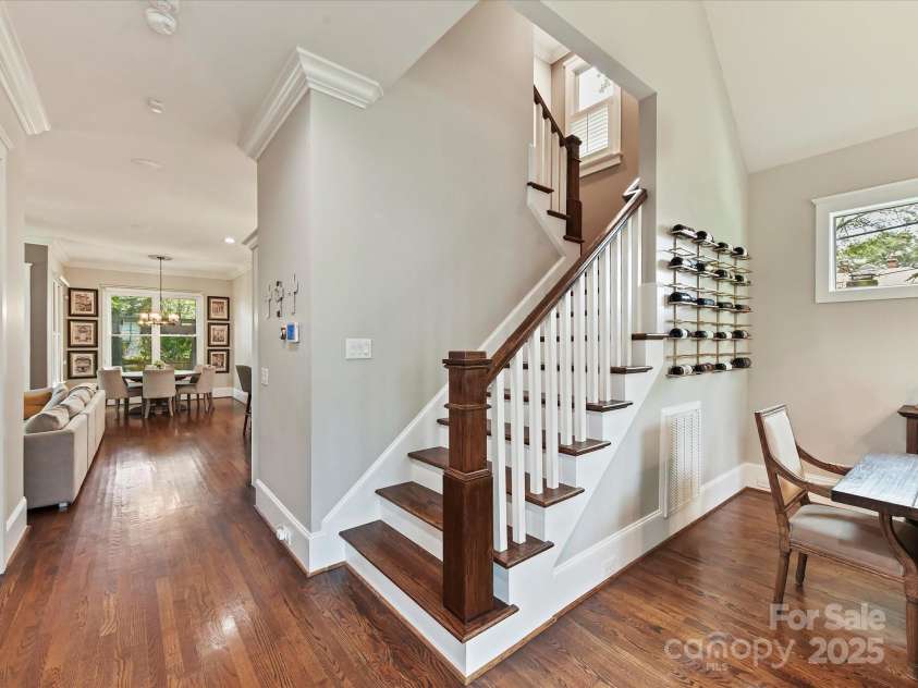 1716 Bay Street, Charlotte, NC 28204.  MLS# CAR4289594, YatesRealty ID 34826. Staircase with wood treads leads to upper level!