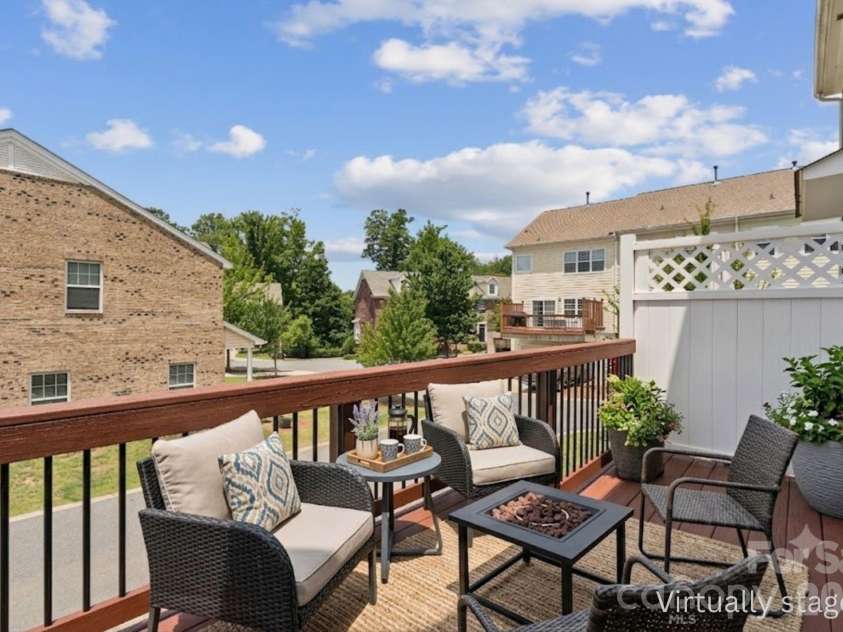 6443 Prosperity Church Road, Charlotte, NC 28269.  MLS# CAR4399263, YatesRealty ID 34840. Balcony virtually staged to give you design ideas