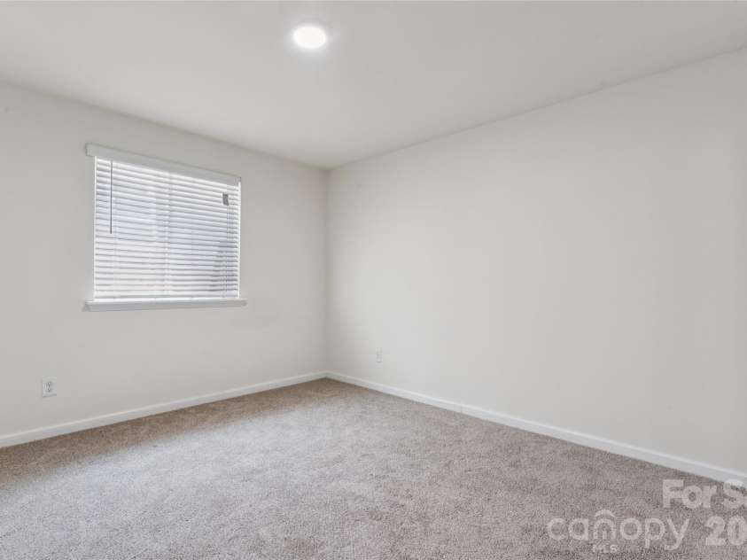 6443 Prosperity Church Road, Charlotte, NC 28269.  MLS# CAR4399263, YatesRealty ID 34840. Bedroom #5 on lower floor
