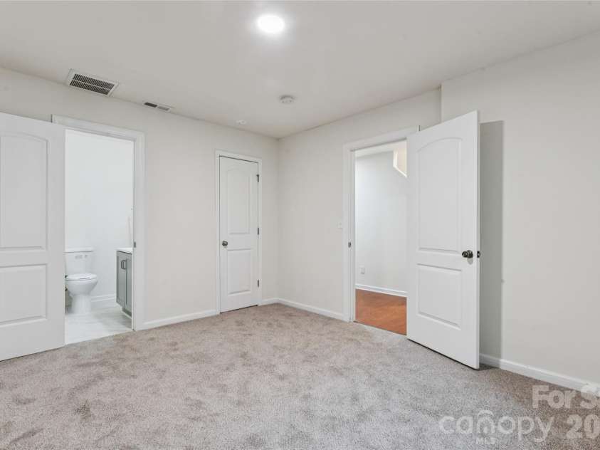 6443 Prosperity Church Road, Charlotte, NC 28269.  MLS# CAR4399263, YatesRealty ID 34840. Bedroom #5 on lower floor