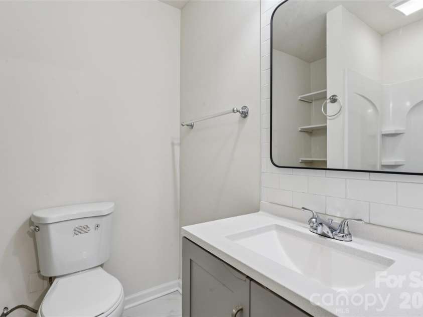 6443 Prosperity Church Road, Charlotte, NC 28269.  MLS# CAR4399263, YatesRealty ID 34840. Full Bathroom on lower floor