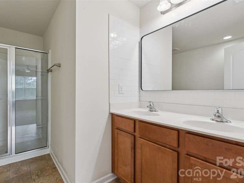 6443 Prosperity Church Road, Charlotte, NC 28269.  MLS# CAR4399263, YatesRealty ID 34840. Primary Bathroom with separate vanities