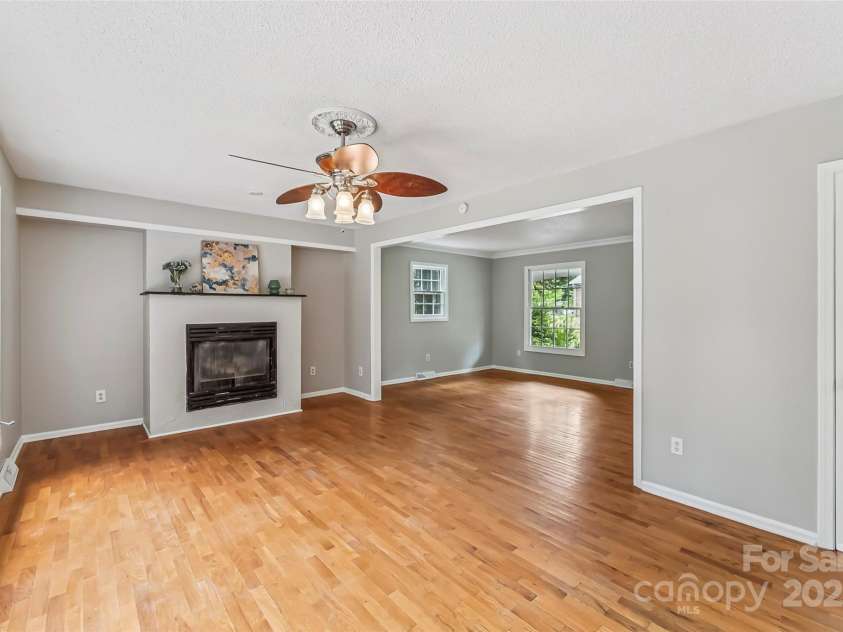 1120 16th Avenue, Hickory, NC 28601.  MLS# CAR4281676, YatesRealty ID 34843. Dining Room with Gas Log Fireplace