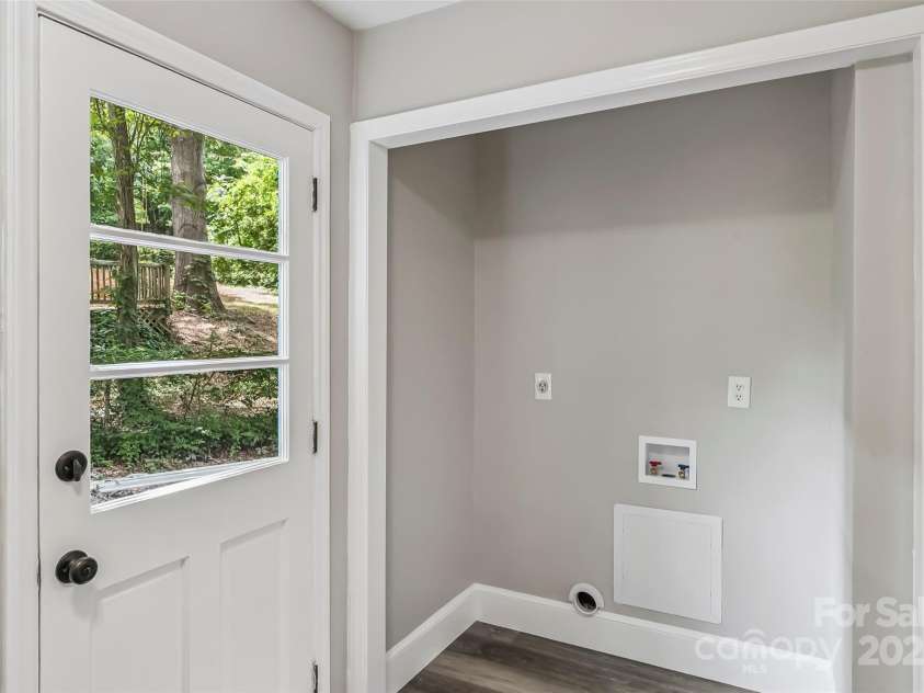 1120 16th Avenue, Hickory, NC 28601.  MLS# CAR4281676, YatesRealty ID 34843. Laundry in Half Bath
