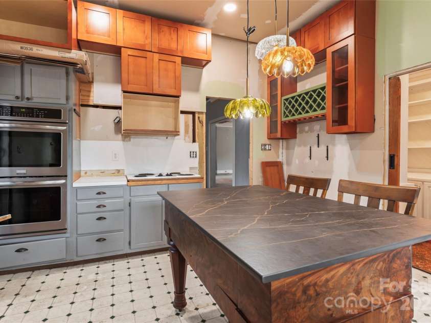 701 Fulton Street, Salisbury, NC 28144.  MLS# CAR4284297, YatesRealty ID 34845. Kitchen View with Dining Room Entrance