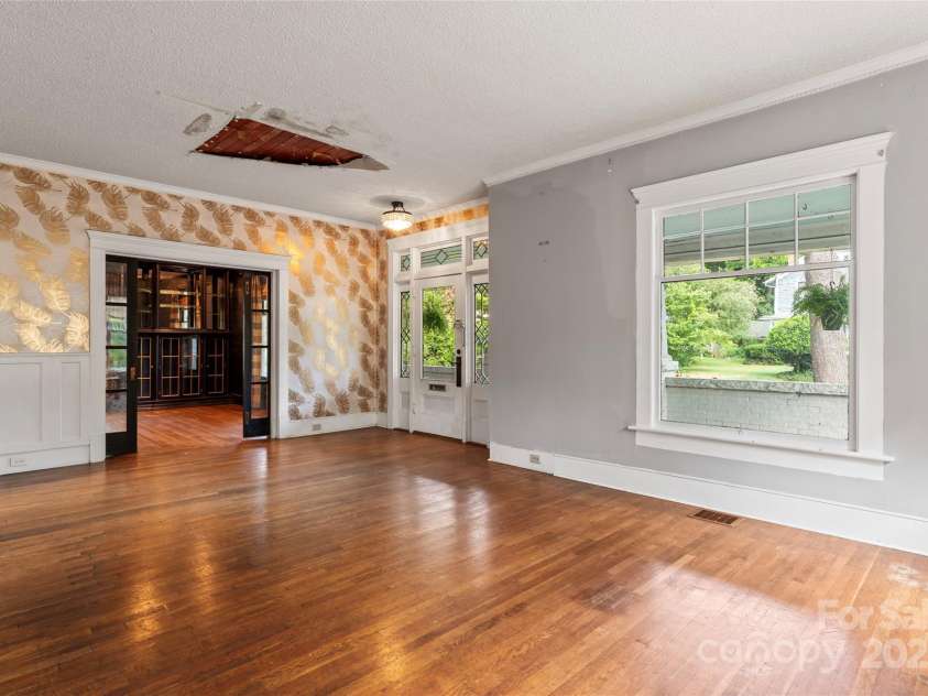 701 Fulton Street, Salisbury, NC 28144.  MLS# CAR4284297, YatesRealty ID 34845. Living Room Looking Into Library