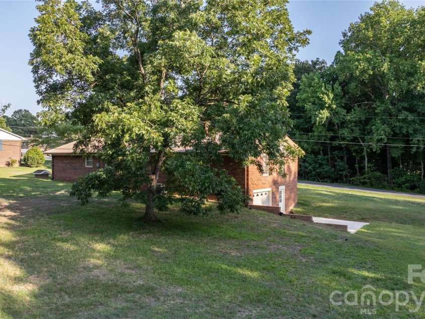 2209 Woodhurst Lane, Albemarle, NC 28001.  MLS# CAR4399796, YatesRealty ID 34856. Backyard