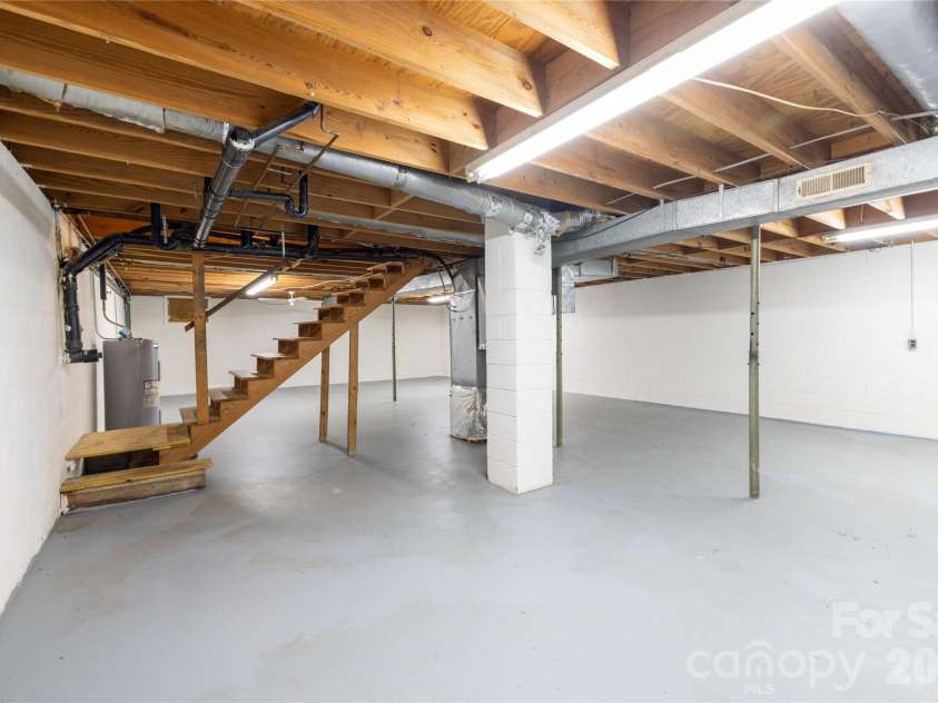 2209 Woodhurst Lane, Albemarle, NC 28001.  MLS# CAR4399796, YatesRealty ID 34856. Basement