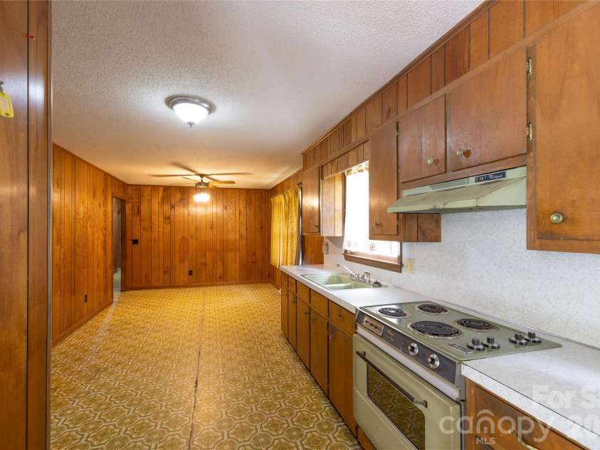 2209 Woodhurst Lane, Albemarle, NC 28001.  MLS# CAR4399796, YatesRealty ID 34856. Entry from Carport
