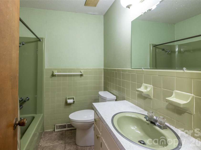 2209 Woodhurst Lane, Albemarle, NC 28001.  MLS# CAR4399796, YatesRealty ID 34856. Hall Bathroom
