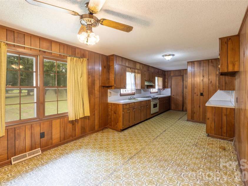 2209 Woodhurst Lane, Albemarle, NC 28001.  MLS# CAR4399796, YatesRealty ID 34856. Kitchen / Dining