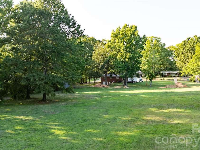 2209 Woodhurst Lane, Albemarle, NC 28001.  MLS# CAR4399796, YatesRealty ID 34856. Side Lot 48