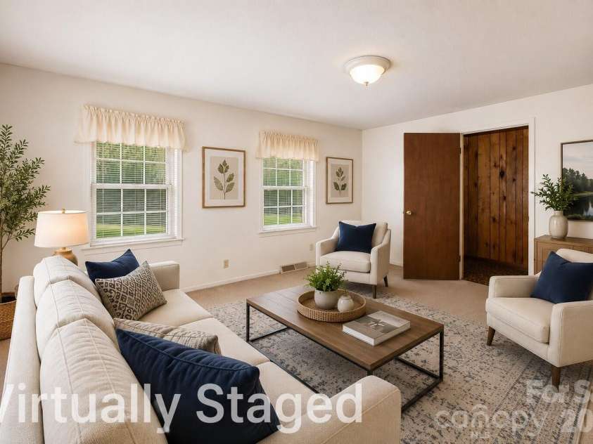 2209 Woodhurst Lane, Albemarle, NC 28001.  MLS# CAR4399796, YatesRealty ID 34856. Virtual Staged Living Room