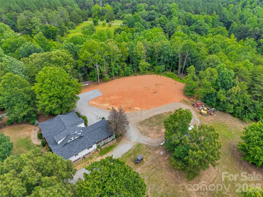 711 Meadow Crest Road, Tryon, NC 28782.  MLS# CAR4399879, YatesRealty ID 34861. Cleared area is ready for your covered riding arena or workshop building.