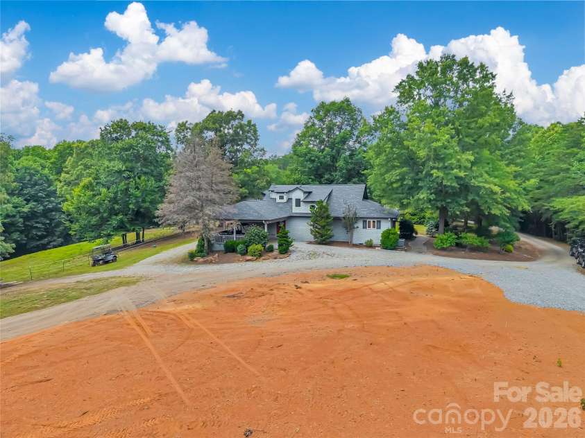 711 Meadow Crest Road, Tryon, NC 28782.  MLS# CAR4399879, YatesRealty ID 34861. Current owners just cleared, leveled and prepped this 135' x 100' area, perfect for use as a riding arena or building pad.