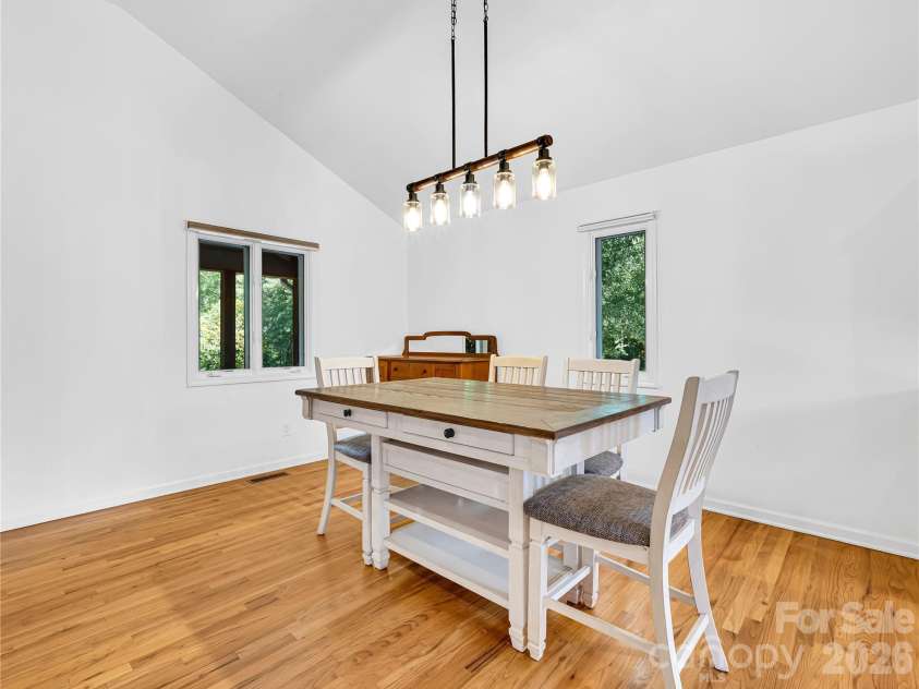 711 Meadow Crest Road, Tryon, NC 28782.  MLS# CAR4399879, YatesRealty ID 34861. Dining space is bright and airy