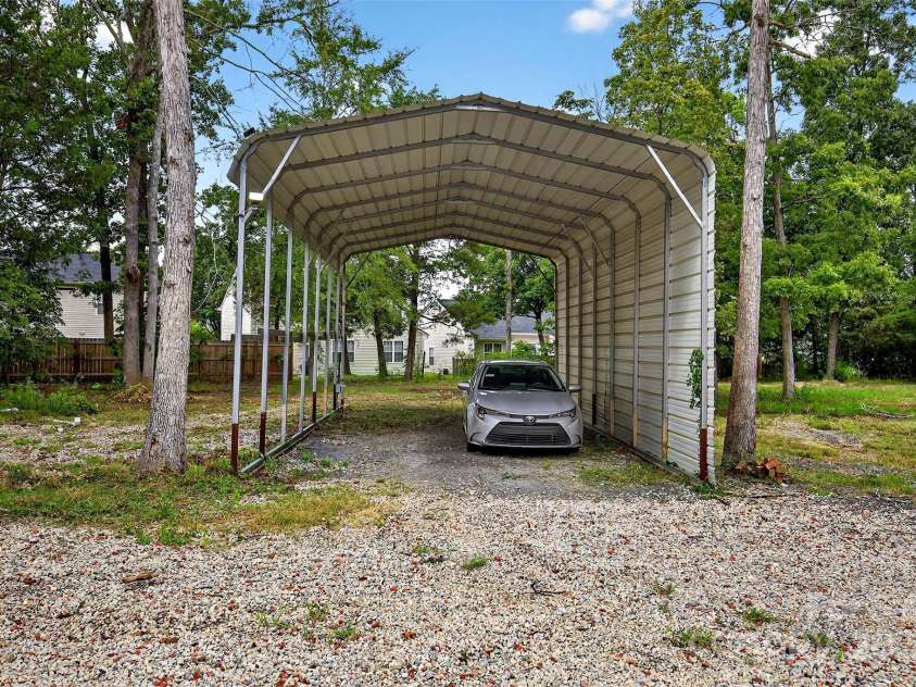 3020 Ridge Road, Charlotte, NC 28269.  MLS# CAR4293606, YatesRealty ID 34864. Cover parking