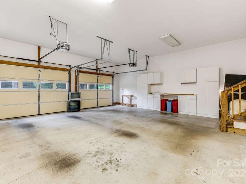 163 Terrace Field Trail, Flat Rock, NC 28731.  MLS# CAR4295496, YatesRealty ID 34865. 2 car garage with room for work bench.