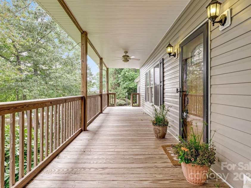 163 Terrace Field Trail, Flat Rock, NC 28731.  MLS# CAR4295496, YatesRealty ID 34865. Large covered front porch.