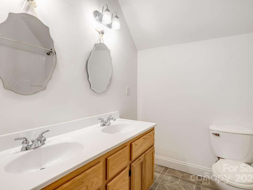163 Terrace Field Trail, Flat Rock, NC 28731.  MLS# CAR4295496, YatesRealty ID 34865. Upstairs bathroom