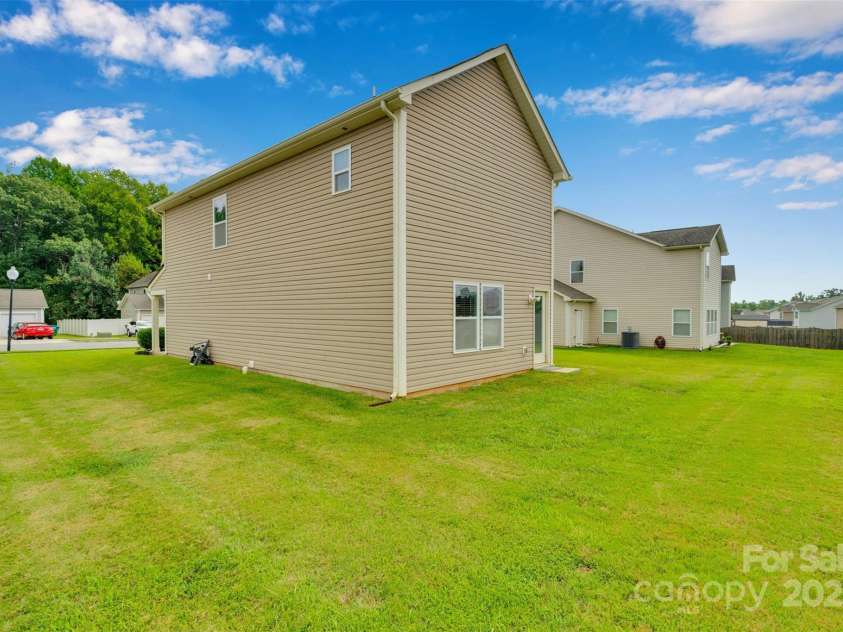 400 Landis Oak Way, Landis, NC 28088.  MLS# CAR4290686, YatesRealty ID 34866. Large backyard