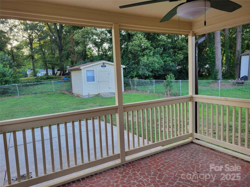 1415 Orvis Street, Charlotte, NC 28216.  MLS# CAR4295107, YatesRealty ID 34867. COVERED BRICK DECK