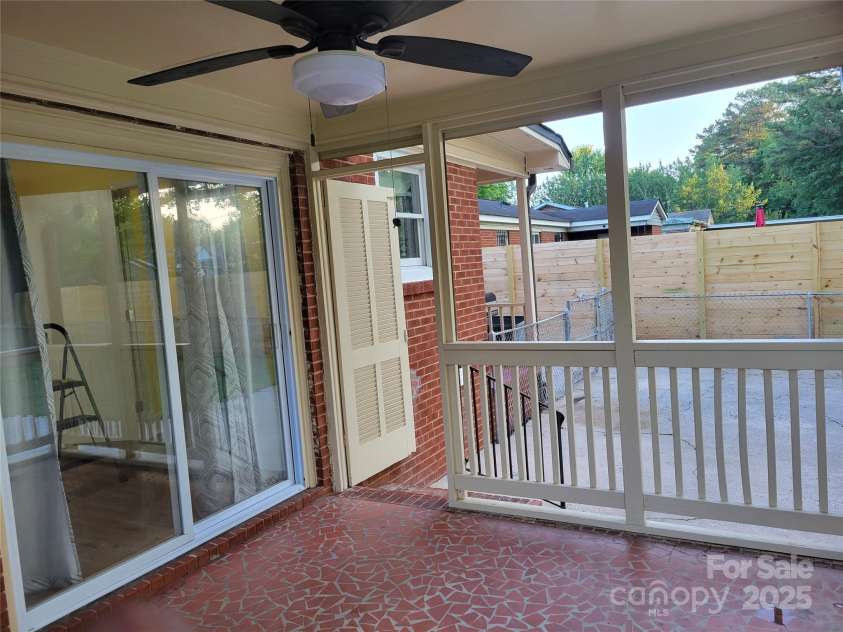 1415 Orvis Street, Charlotte, NC 28216.  MLS# CAR4295107, YatesRealty ID 34867. COVERED BRICK DECK