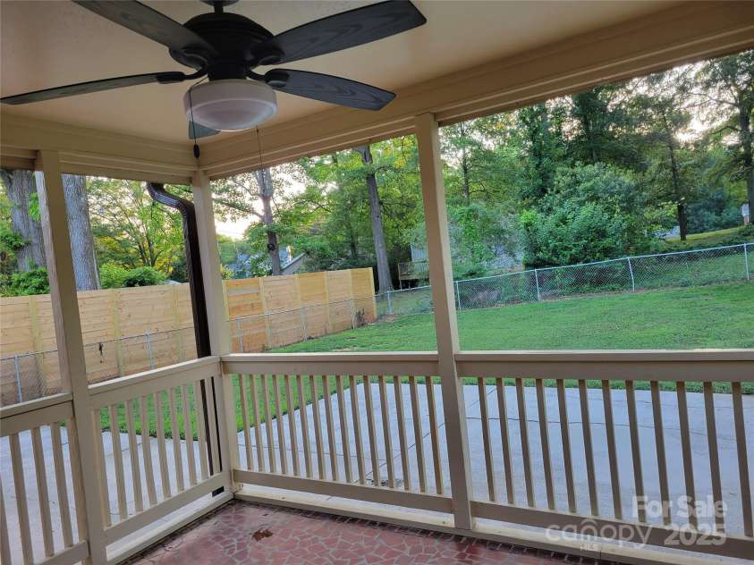 1415 Orvis Street, Charlotte, NC 28216.  MLS# CAR4295107, YatesRealty ID 34867. COVERED BRICK DECK