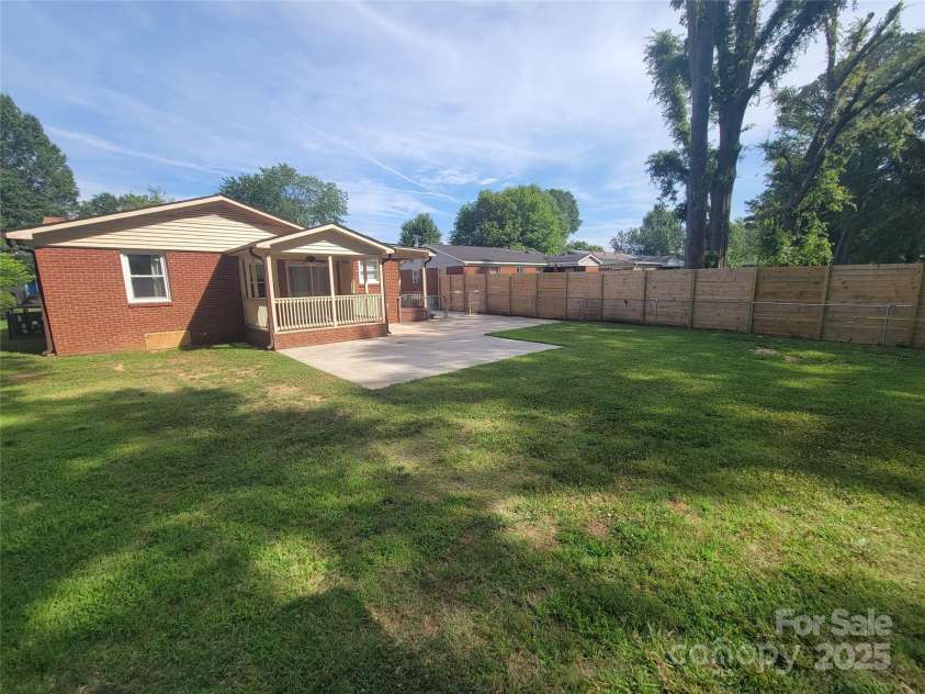 1415 Orvis Street, Charlotte, NC 28216.  MLS# CAR4295107, YatesRealty ID 34867. REAR YARD & PATIO