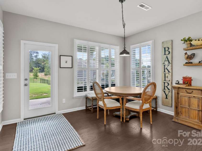 12710 Longford Crossing Place, Huntersville, NC 28078.  MLS# CAR4294654, YatesRealty ID 34868. Gorgeous breakfast nook leads to the covered rear patio