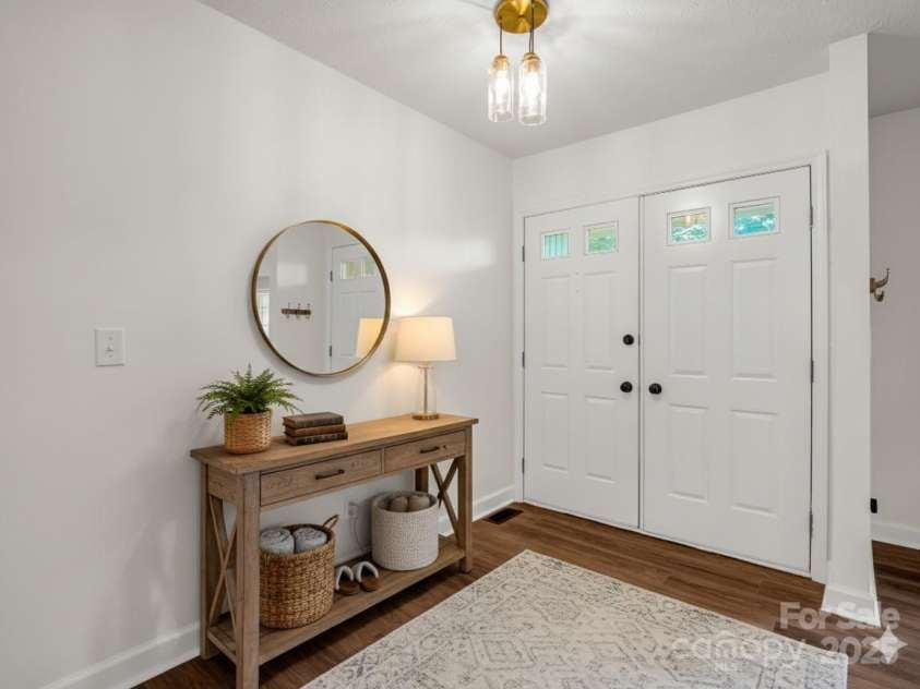 30 Patti Drive, Fletcher, NC 28732.  MLS# CAR4296193, YatesRealty ID 34869. Large entry welcome you into open concept living. Brand new LVP flooring throughout. (Virtually Staged)